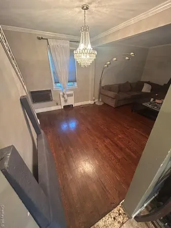 a view of a livingroom with furniture window