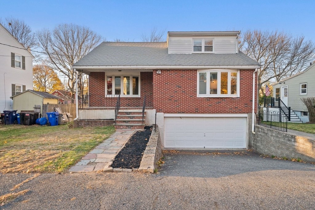 a front view of house with a yard