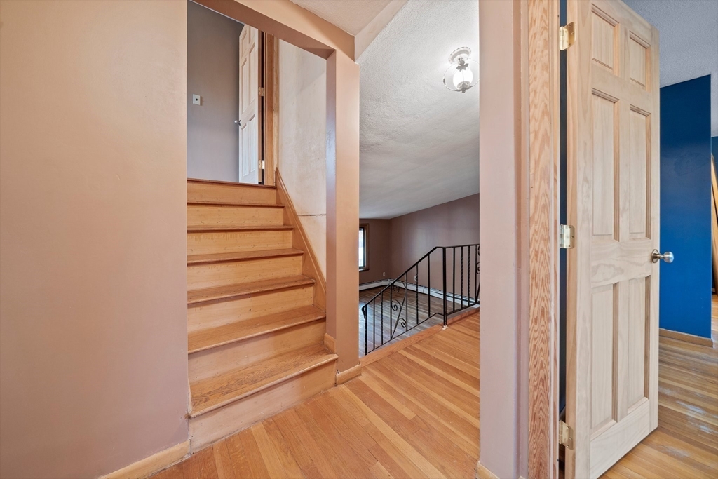 12 Prospect Park Boston, MA 02136 - Photo 17 of 42 a view of entryway and hall with wooden floor