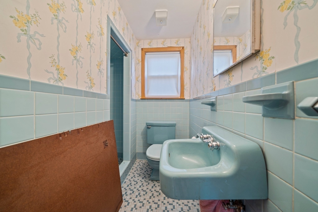 12 Prospect Park Boston, MA 02136 - Photo 29 of 42 a bathroom with a sink and a mirror