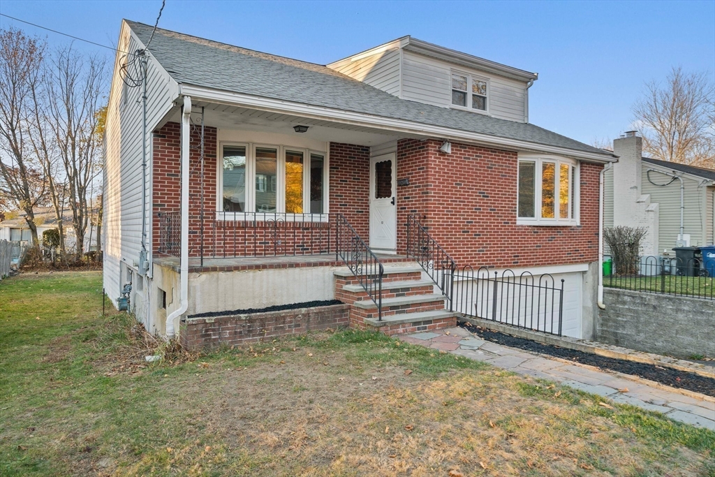 12 Prospect Park Boston, MA 02136 - Photo 42 of 42 a front view of a house with a yard