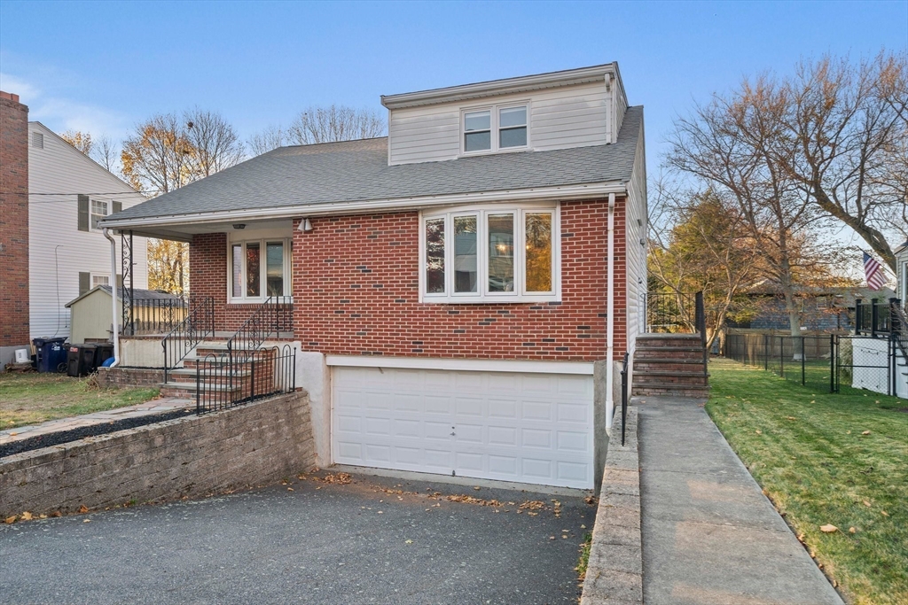 12 Prospect Park Boston, MA 02136 - Photo 5 of 42 a front view of a house with garden