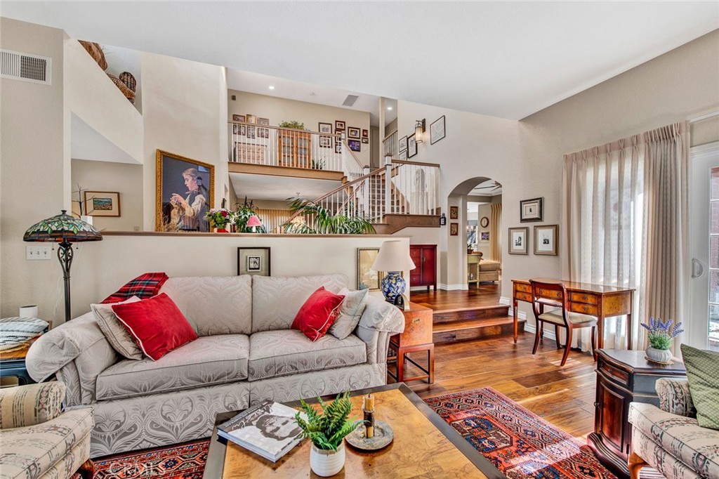 7214 East Wrangler Circle Orange, CA 92869 - Photo 13 of 69 a living room with furniture and wooden floor
