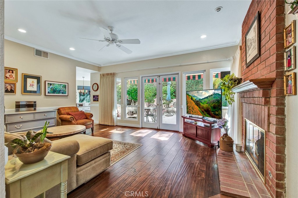 7214 East Wrangler Circle Orange, CA 92869 - Photo 17 of 69 a living room with furniture and a flat screen tv