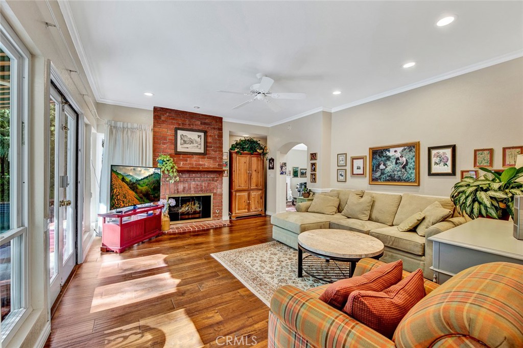 7214 East Wrangler Circle Orange, CA 92869 - Photo 21 of 69 a living room with furniture and a fireplace