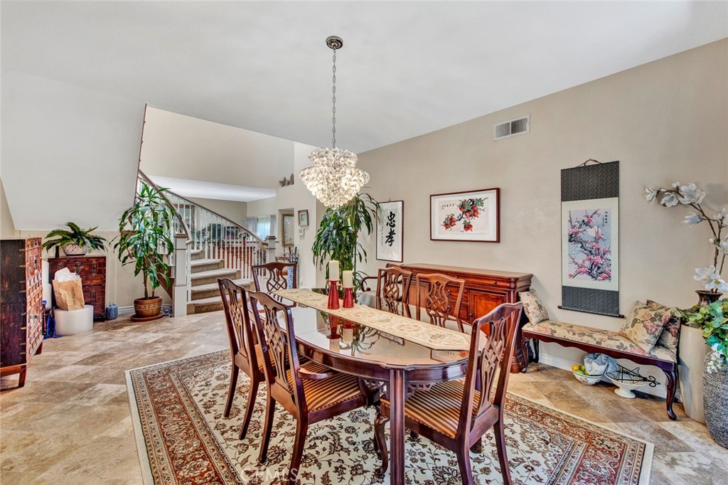 7214 East Wrangler Circle Orange, CA 92869 - Photo 34 of 69 a view of a dining room with furniture
