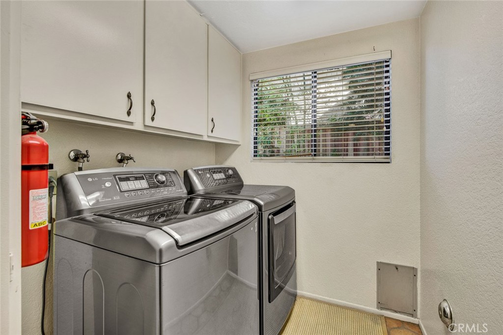 7214 East Wrangler Circle Orange, CA 92869 - Photo 38 of 69 a stove top oven sitting inside of a kitchen