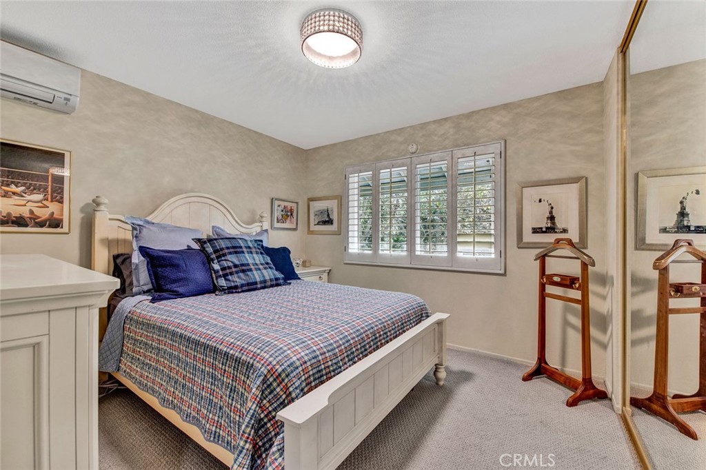 7214 East Wrangler Circle Orange, CA 92869 - Photo 46 of 69 a bedroom with a bed and a window