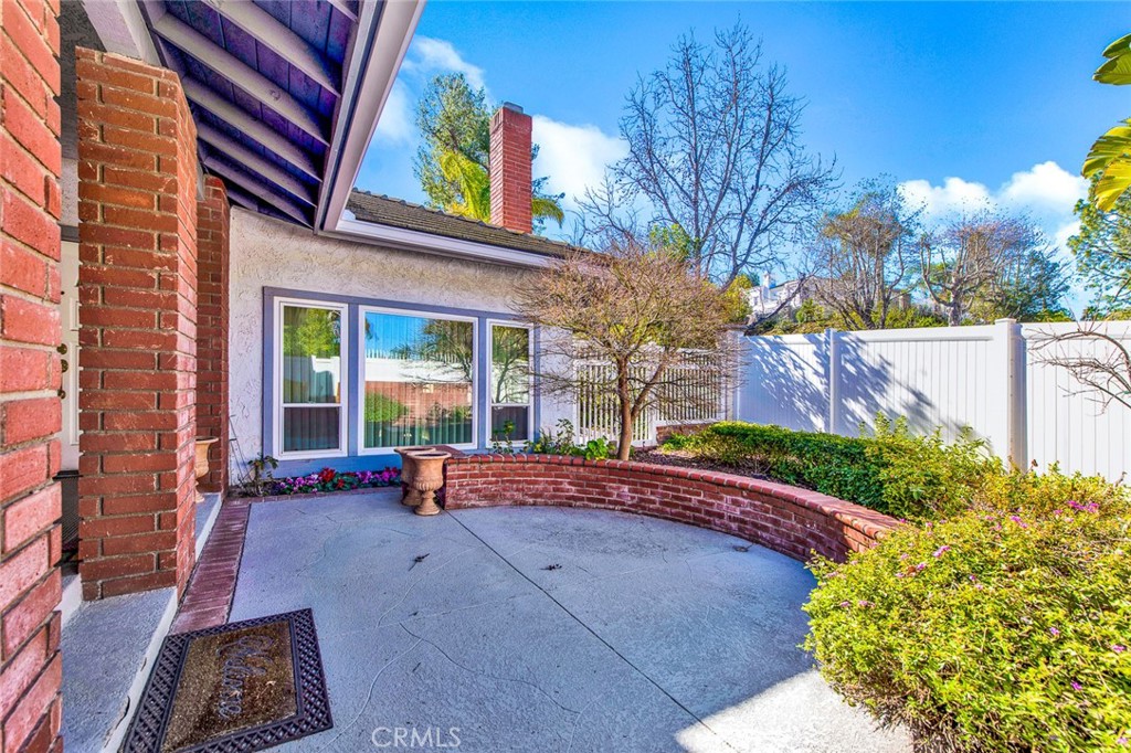 7214 East Wrangler Circle Orange, CA 92869 - Photo 5 of 69 a backyard of a house with outdoor seating