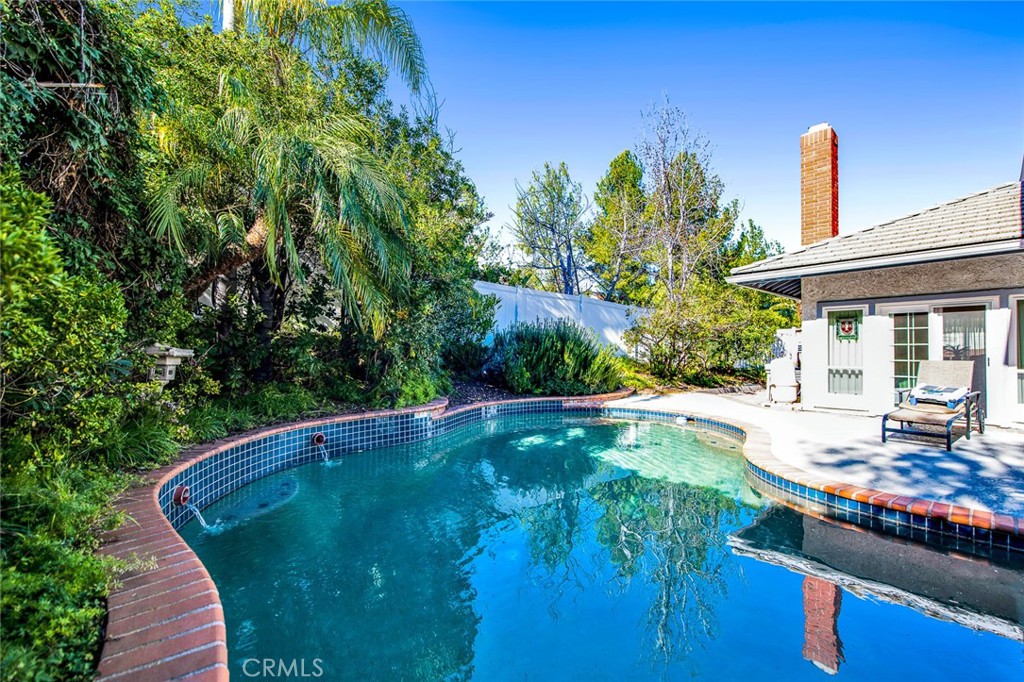 7214 East Wrangler Circle Orange, CA 92869 - Photo 64 of 69 a view of a swimming pool with a patio