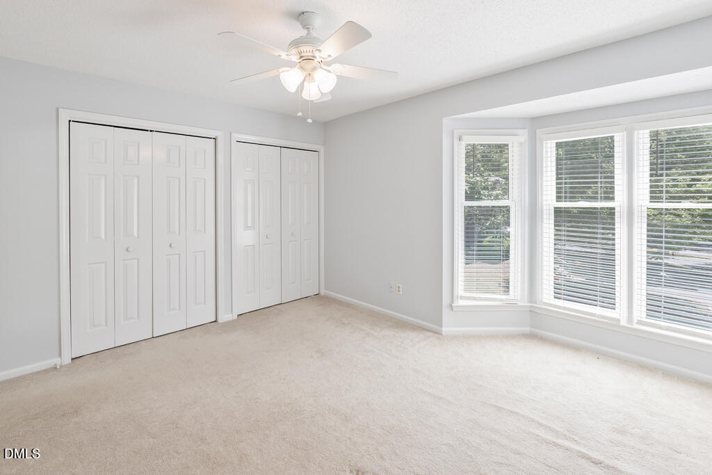 2831 Edridge Court, Unit 202 Raleigh, NC 27612 - Photo 20 of 33 a view of an empty room with a window