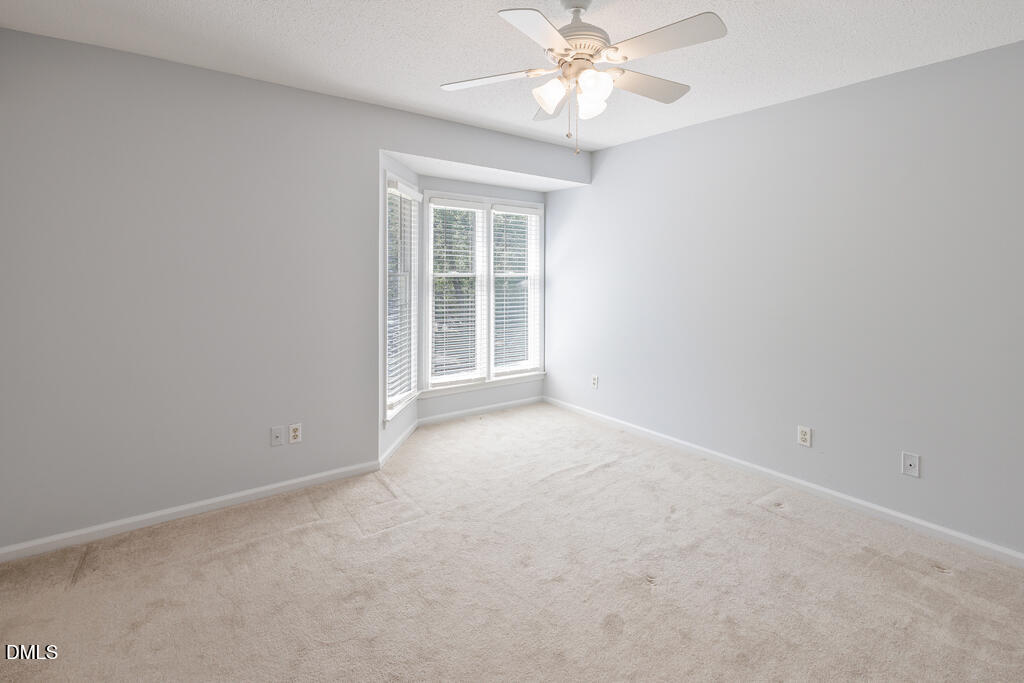 2831 Edridge Court, Unit 202 Raleigh, NC 27612 - Photo 21 of 33 an empty room with a window