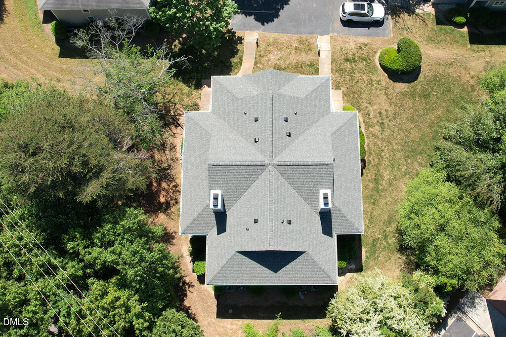 2831 Edridge Court, Unit 202 Raleigh, NC 27612 - Photo 29 of 33 an aerial view of a house with swimming pool