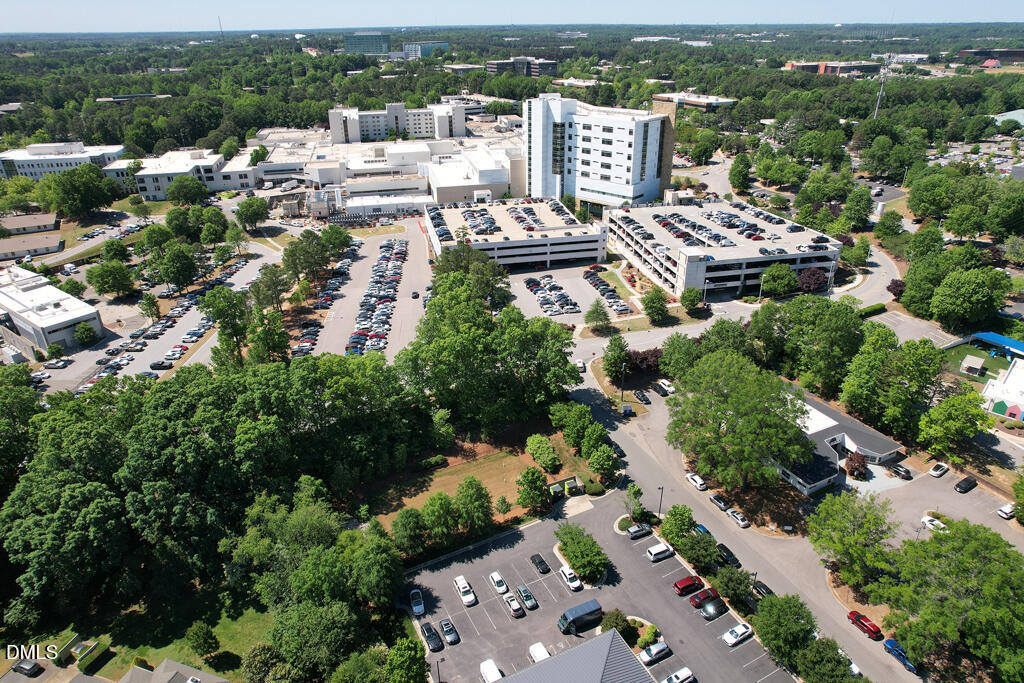 2831 Edridge Court, Unit 202 Raleigh, NC 27612 - Photo 30 of 33 an aerial view of a city with lots of residential buildings