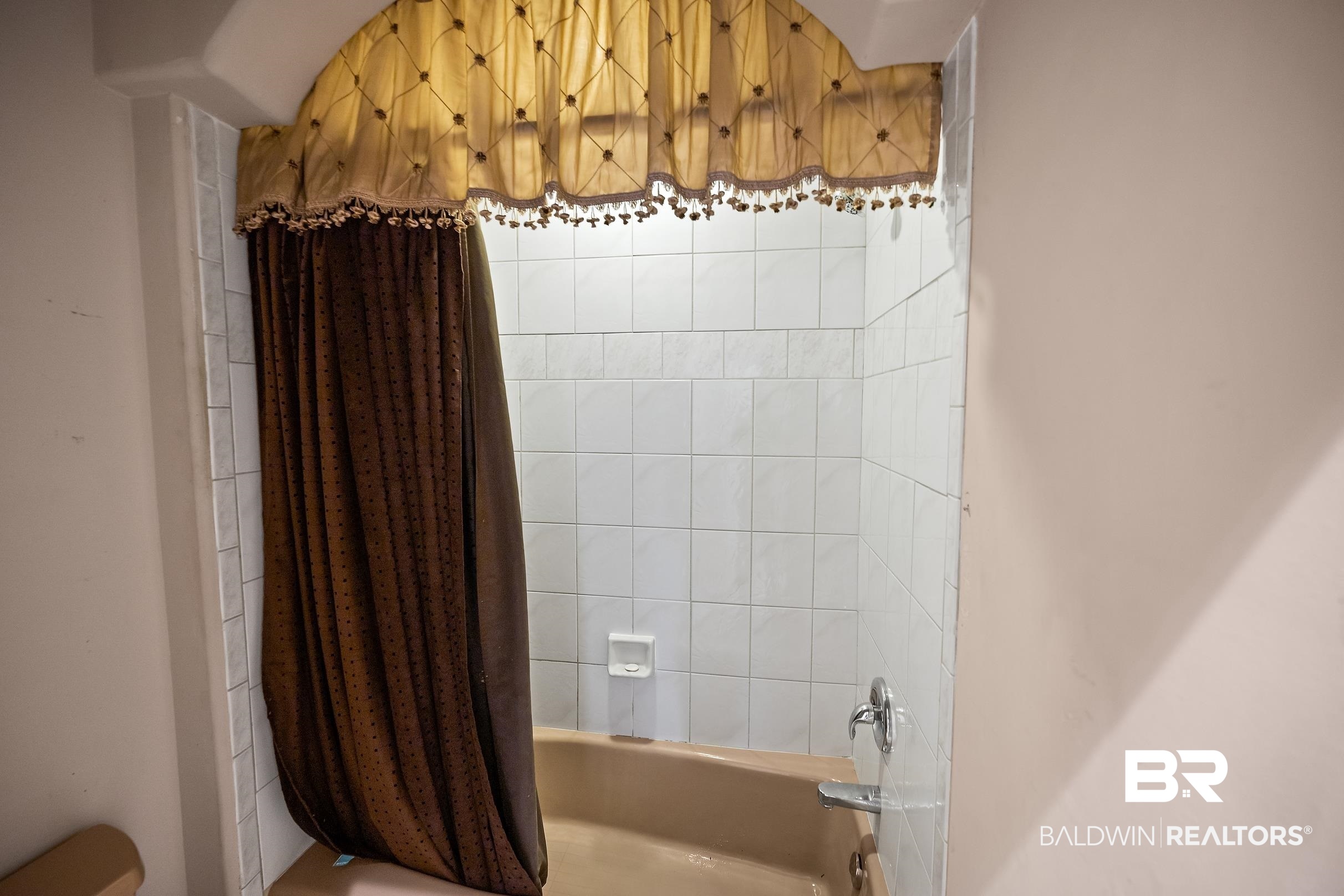 8591 Bay Harbor Road Elberta, AL 36530 - Photo 38 of 56 Bathroom featuring shower / bath combo with shower curtain