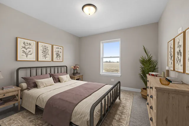 a bed room with a bed and a potted plant