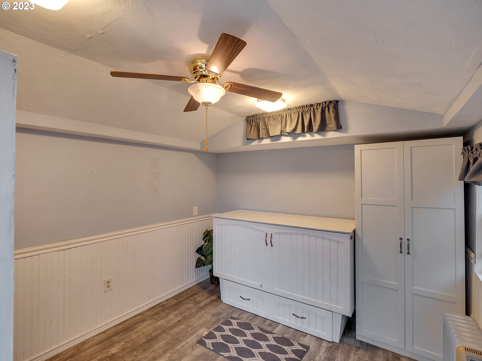 6701 Southeast Hazel Street Portland, OR 97206 - Photo 15 of 20 a view of an empty room with a window