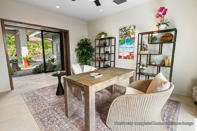 a spacious bathroom with a tub sink and mirror
