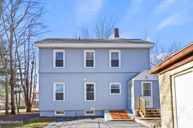 an aerial view of residential house with outdoor space
