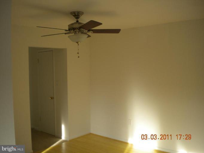 11507 Amherst Avenue, Unit 101 Silver Spring, MD 20902 - Photo 5 of 6 a view of a hallway