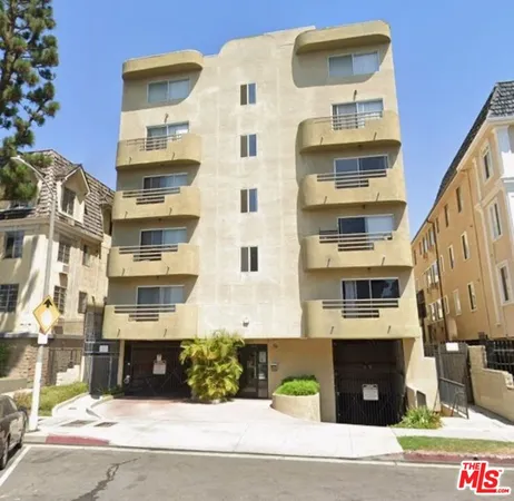 a front view of a building with street view