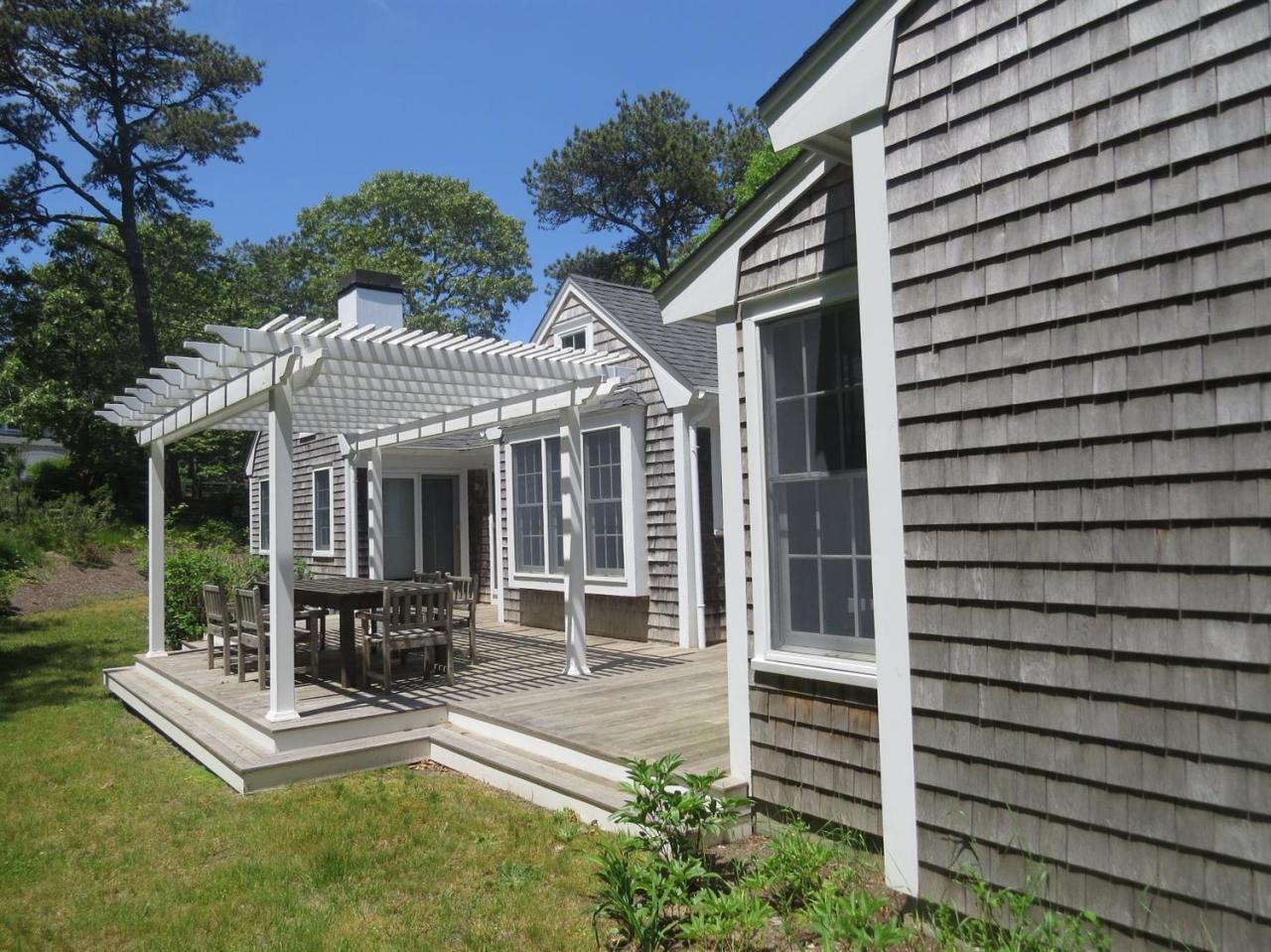 80 Middle Road Chatham, MA 02650 - Photo 6 of 21 a view of a house with a backyard