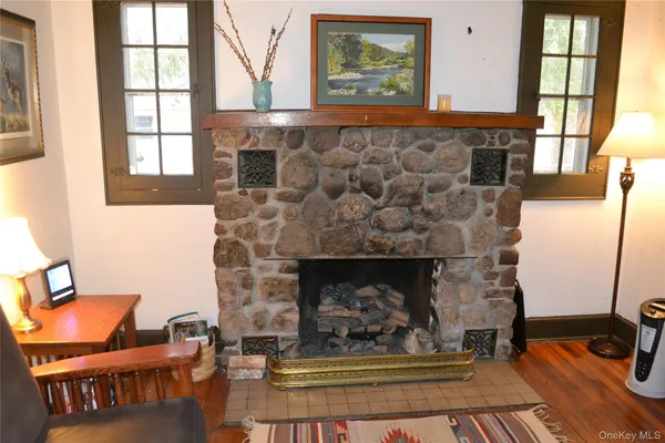 a kitchen with sink a refrigerator and a stove