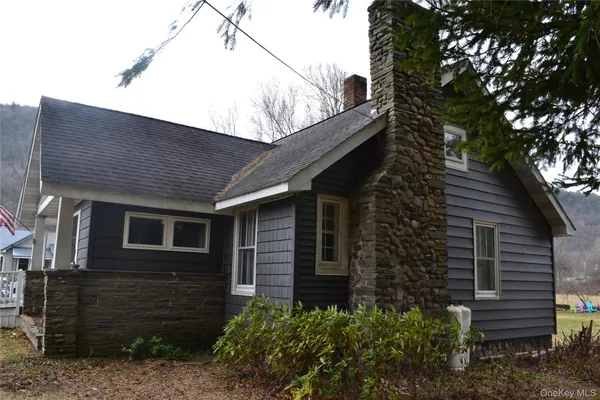 a front view of a house with garage