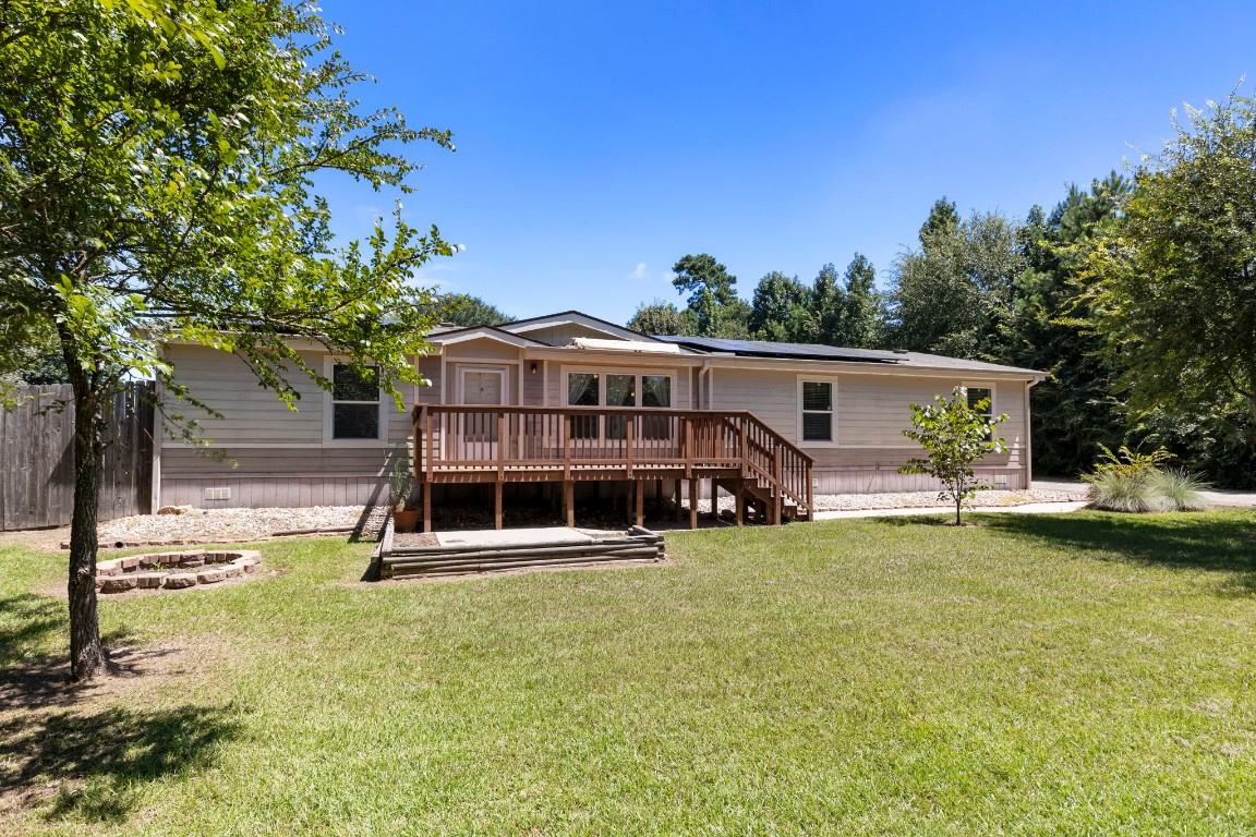 25330 Settlers Mill Road Magnolia, TX 77355 - Photo 1 of 21 a view of a house with swimming pool and sitting area