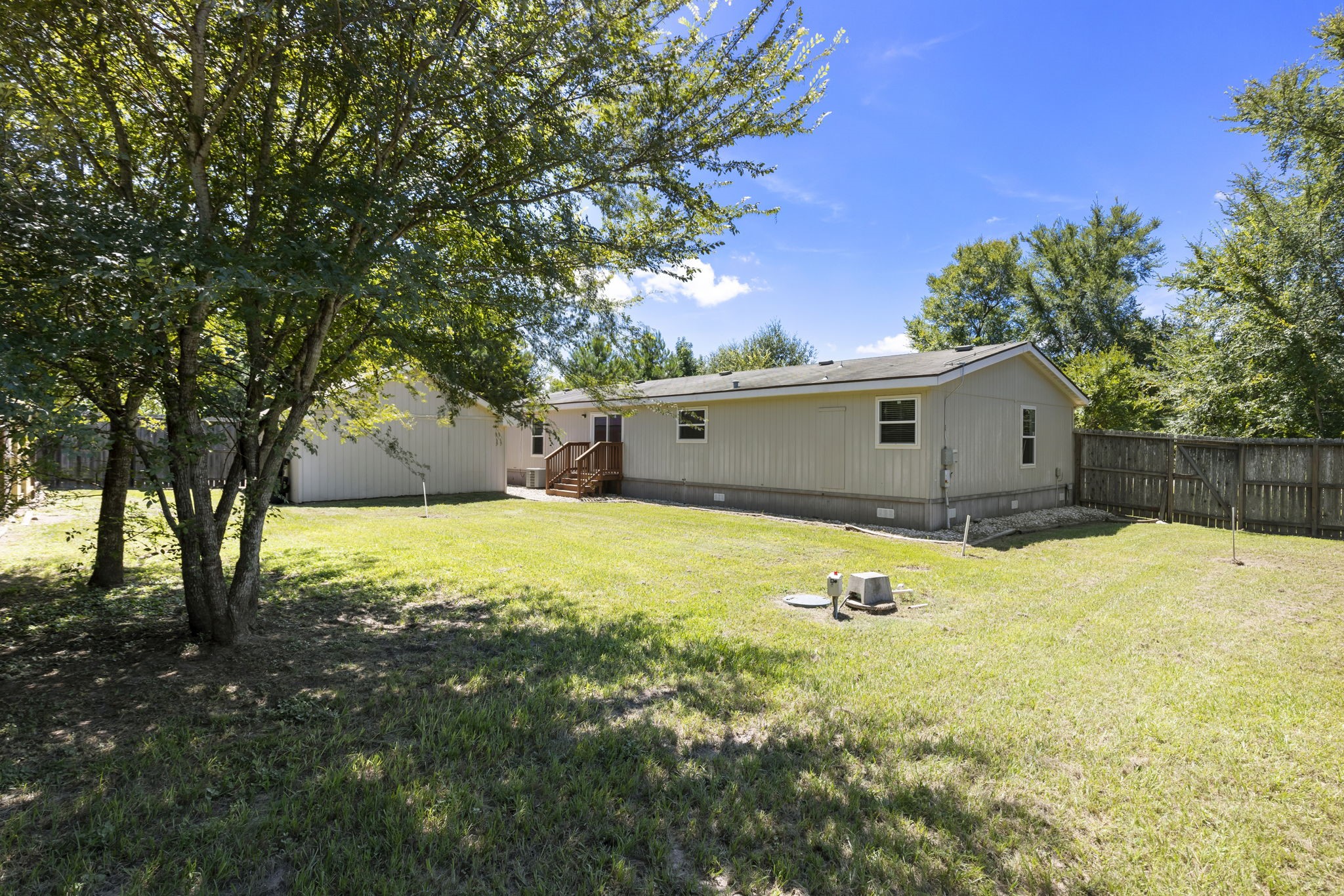 25330 Settlers Mill Road Magnolia, TX 77355 - Photo 15 of 21 a house view with a backyard space