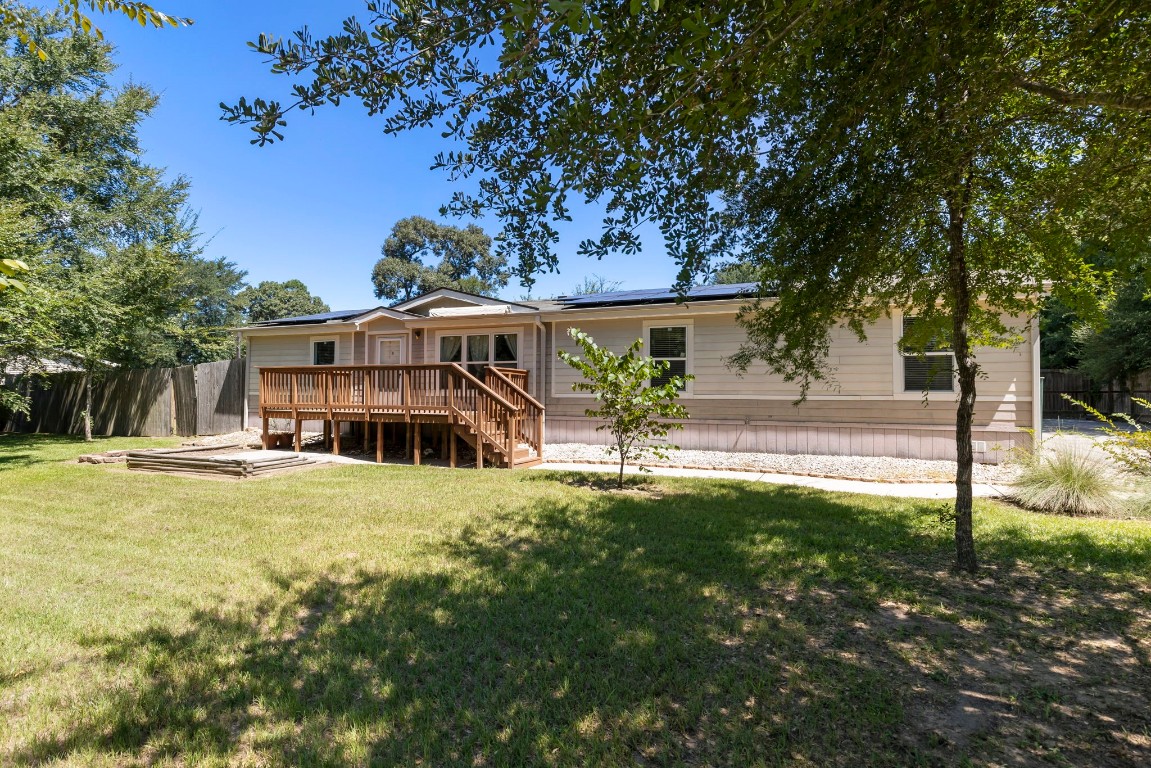 25330 Settlers Mill Road Magnolia, TX 77355 - Photo 2 of 21 a house with swimming pool in front of it