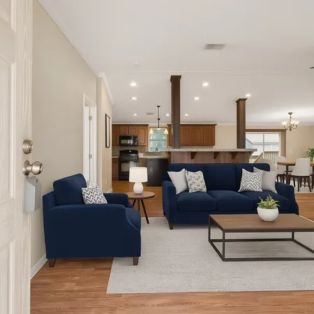 a living room with furniture and a potted plant