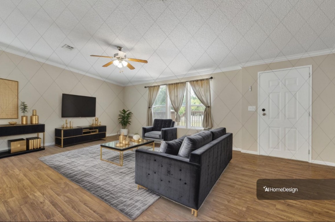 25330 Settlers Mill Road Magnolia, TX 77355 - Photo 5 of 21 a living room with furniture and a flat screen tv