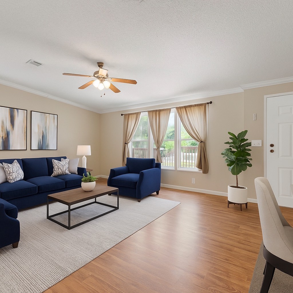 25330 Settlers Mill Road Magnolia, TX 77355 - Photo 6 of 21 a living room with furniture and a large window
