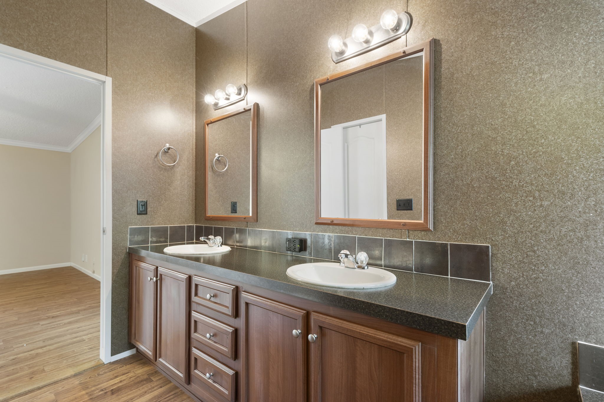 25330 Settlers Mill Road Magnolia, TX 77355 - Photo 8 of 21 a bathroom with a sink double vanity and a mirror