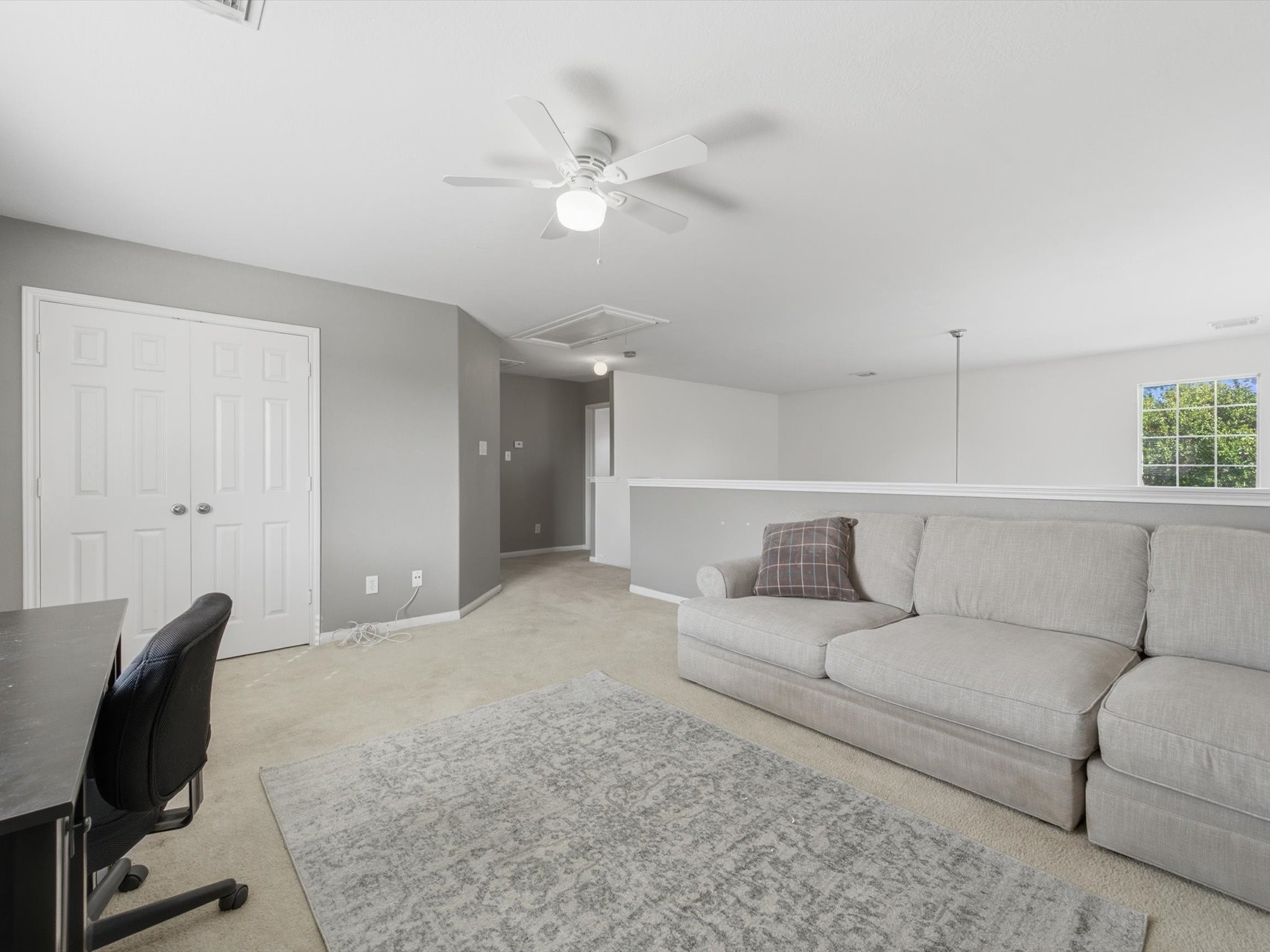 21631 Falvel Misty Drive Spring, TX 77388 - Photo 17 of 29 a living room with furniture and a chair