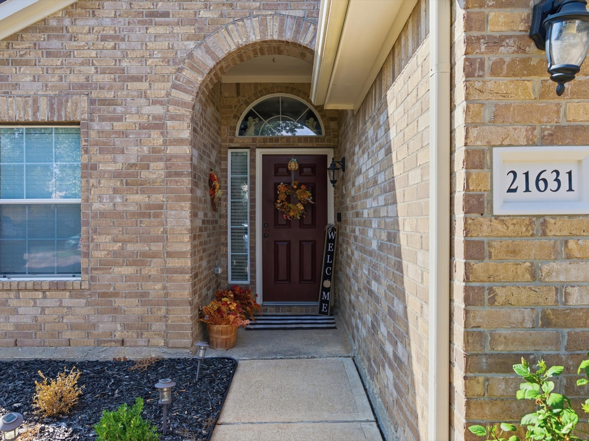 21631 Falvel Misty Drive Spring, TX 77388 - Photo 3 of 29 a front view of a house with a garden