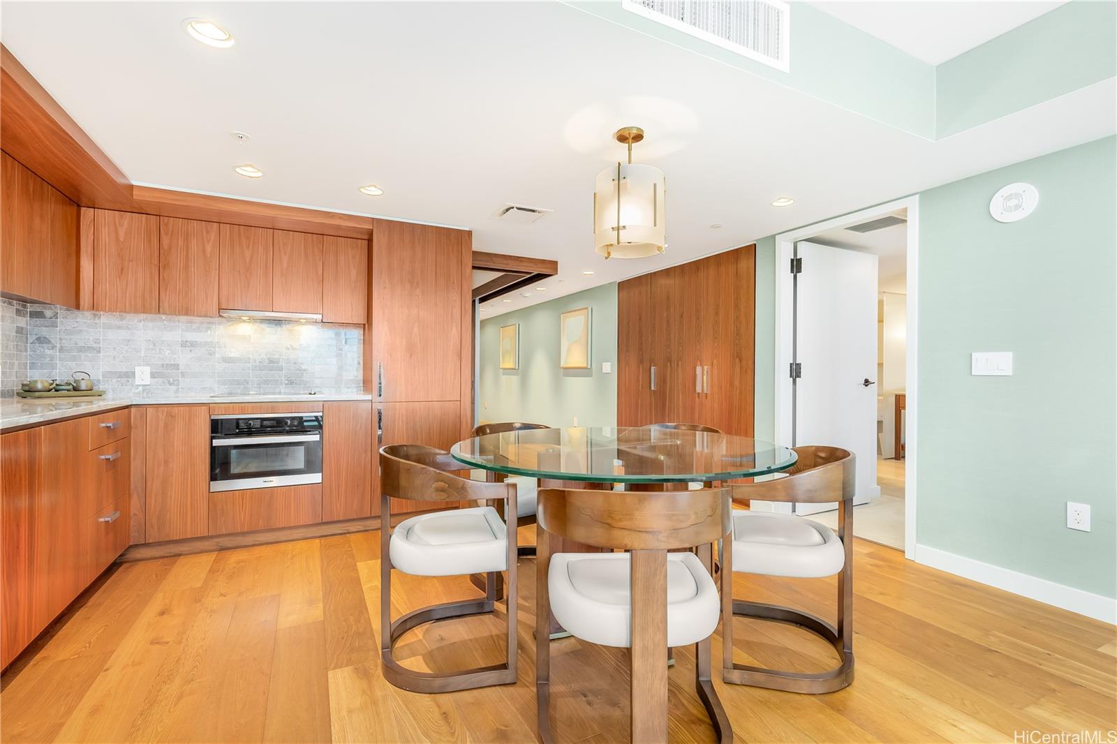 2139 Kūhiō Avenue, Unit 34 Honolulu, HI 96815 - Photo 8 of 25 a kitchen with a sink cabinets and appliances