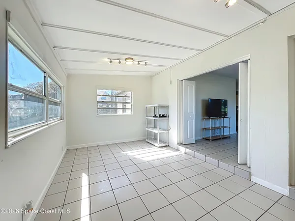 a view of an empty room and window