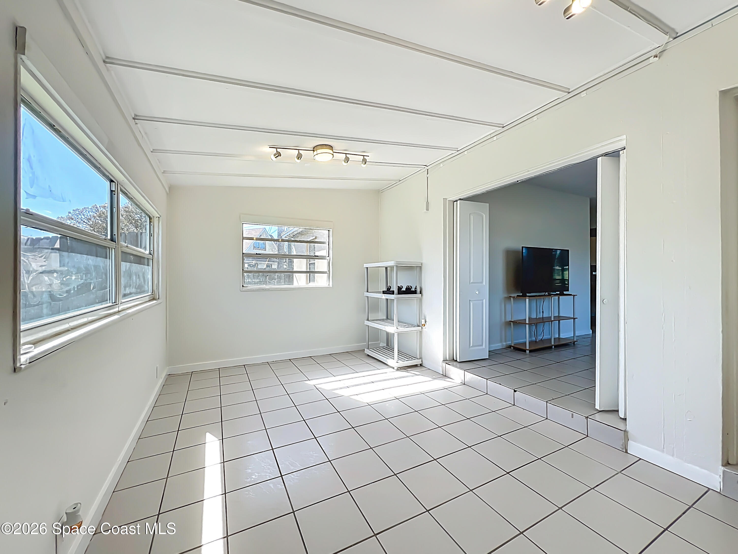 1090 Bianca Drive Northeast Palm Bay, FL 32905 - Photo 12 of 30 a view of an empty room and window