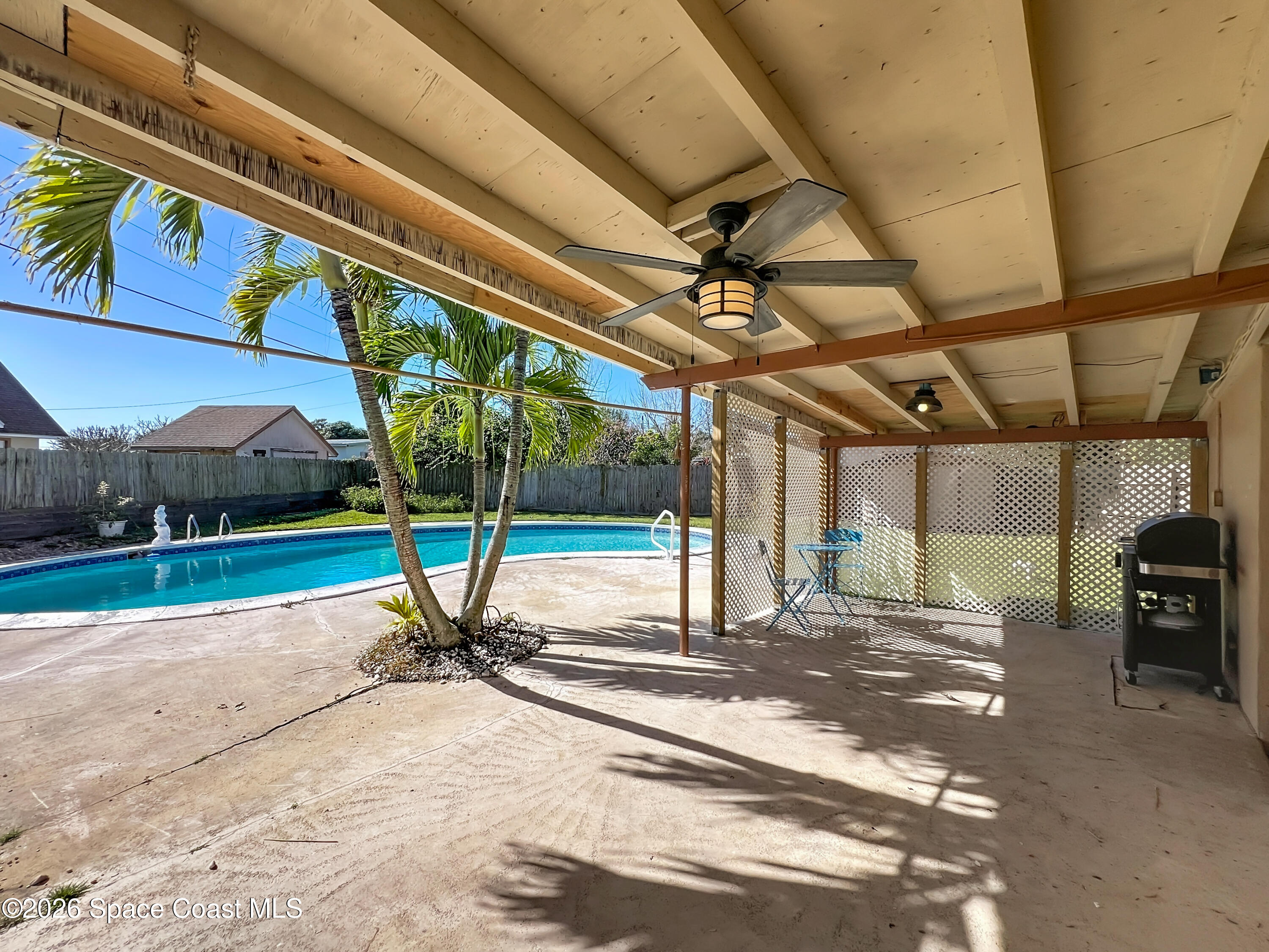 1090 Bianca Drive Northeast Palm Bay, FL 32905 - Photo 23 of 30 a view of a park with wooden fence