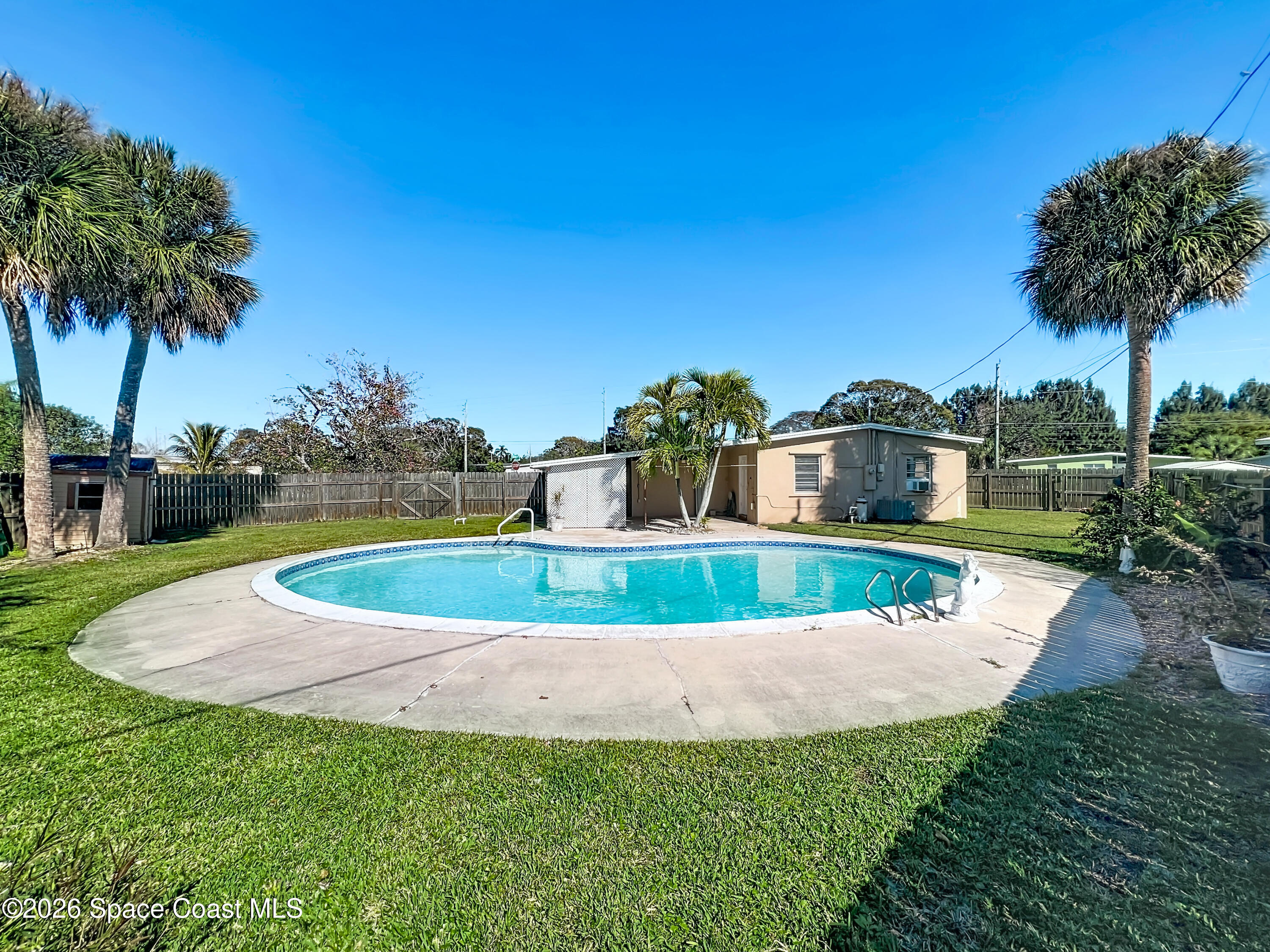 1090 Bianca Drive Northeast Palm Bay, FL 32905 - Photo 26 of 30 a view of outdoor space yard and deck