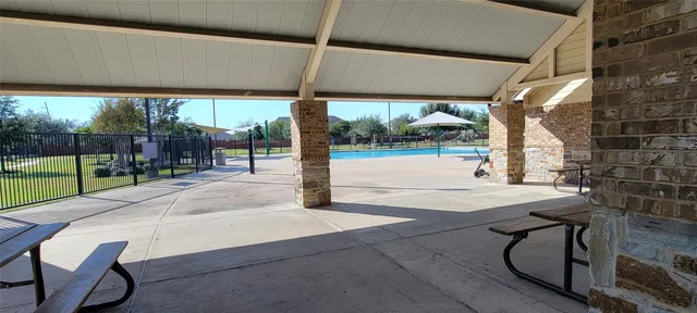 a front view of a house with a yard and porch