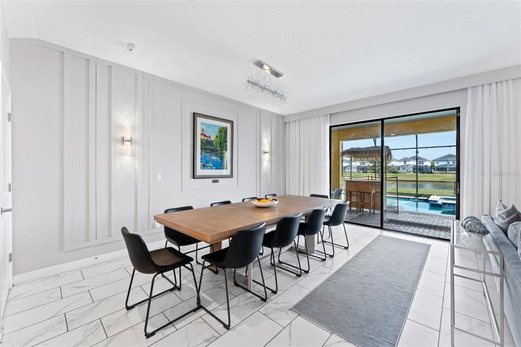 2933 Fable Street Kissimmee, FL 34746 - Photo 14 of 53 a dining room with furniture and window