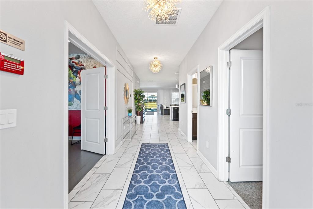 2933 Fable Street Kissimmee, FL 34746 - Photo 3 of 53 a bathroom with a bathtub and a shower