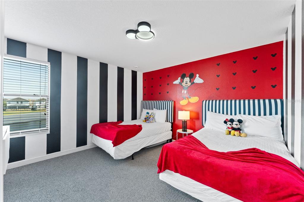 2933 Fable Street Kissimmee, FL 34746 - Photo 34 of 53 a bed room with two bed and a chair