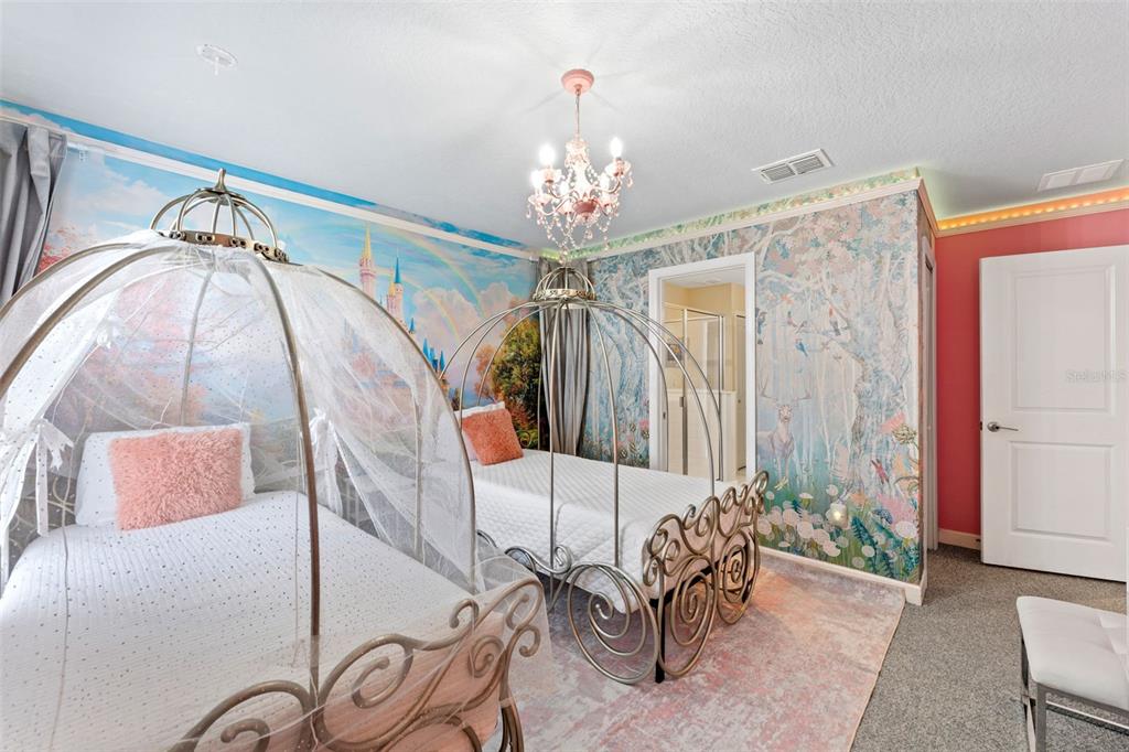 2933 Fable Street Kissimmee, FL 34746 - Photo 36 of 53 a view of a dining room with furniture and chandelier