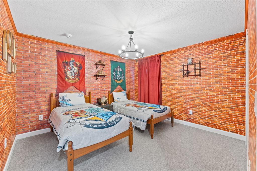 2933 Fable Street Kissimmee, FL 34746 - Photo 39 of 53 a bedroom with a bed and a window