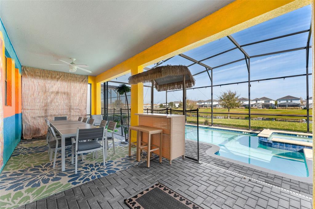 2933 Fable Street Kissimmee, FL 34746 - Photo 42 of 53 a view of a swimming pool with seating area