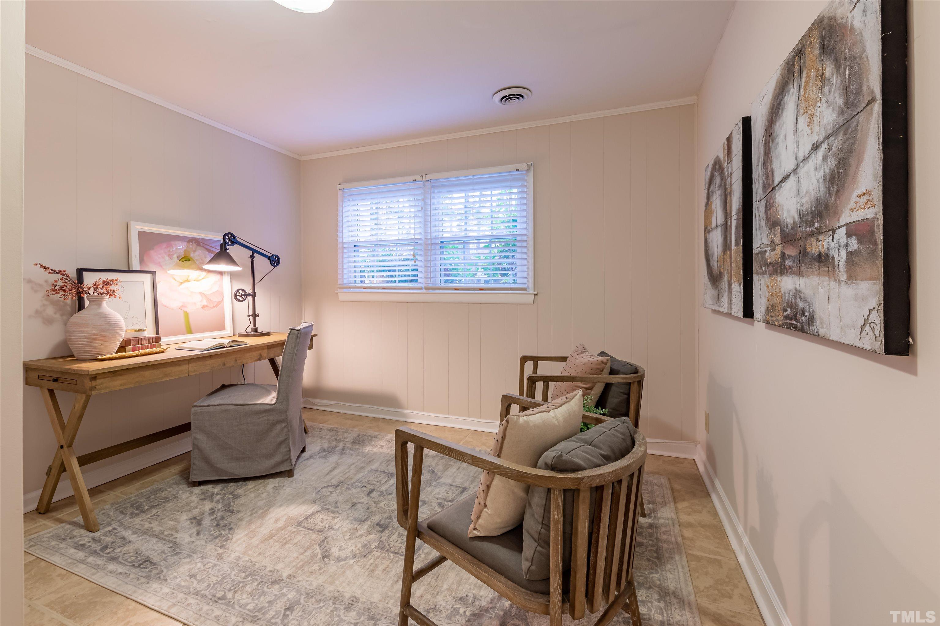 3101 Sherry Drive Raleigh, NC 27604 - Photo 18 of 28 a living room with furniture and a window
